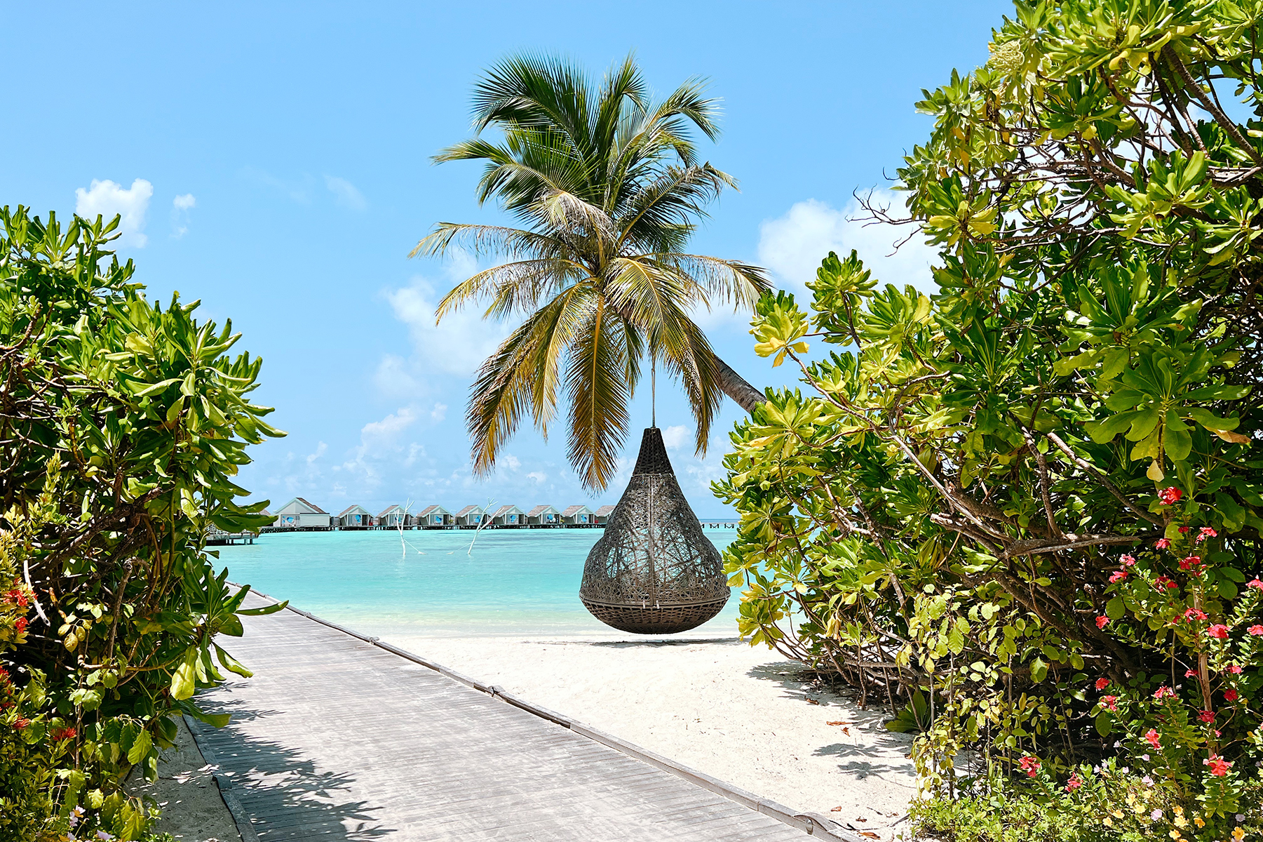 Jetty and beach at Lux South Ari Atoll in the Maldives